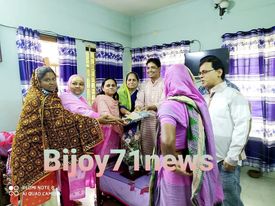 গরীব অসহায়দের মাঝে কাপড় বিতরণ